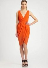 Оранжевое платье тюльпан длины миди
