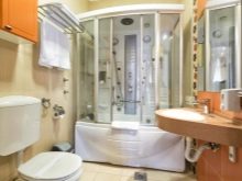 Дизайн душевой кабины в маленькой ванной комнате с фото