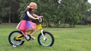 Боковые колеса для велосипеда: как выбрать и установить?
