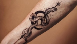Что означают тату со змеями и куда их наносить?