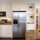 Холодильник на кухне: где можно установить в интерьере?