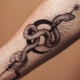 Что означают тату со змеями и куда их наносить?