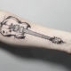 Значение и эскизы тату в виде гитары