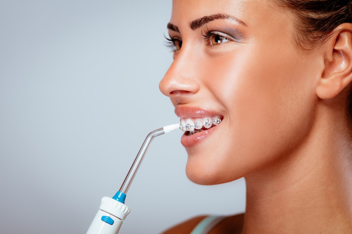 как чистить зубы ирригатором